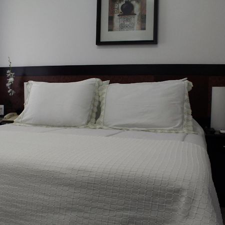 Hotel Dom Henrique Timóteo Extérieur photo