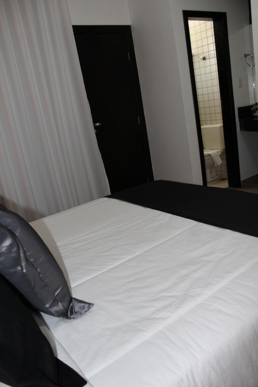 Hotel Dom Henrique Timóteo Extérieur photo